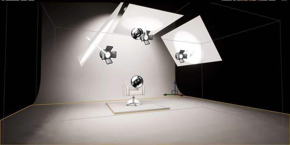 Digital studio containing a continuous backdrop, overhead light panels and a chair at the centre